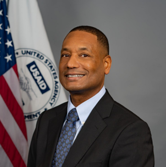  USAID Counselor, Mr. Clinton D. White.