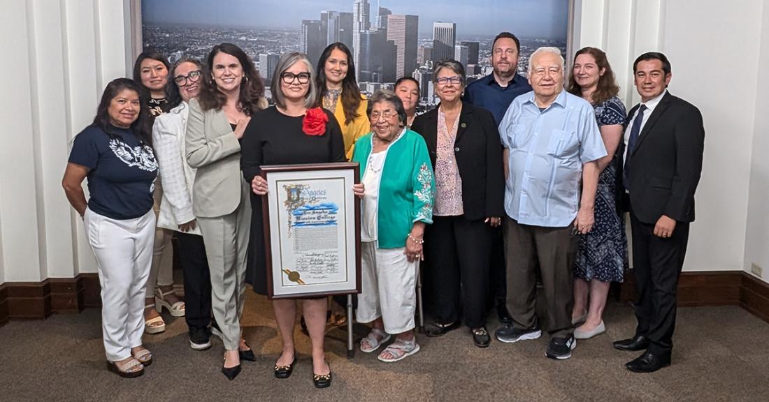 Group photo of Councilwoman Rodriguez, College President Ornelas, with college administrators & staff, and college founders, holding the City Council Certificate of Recognition