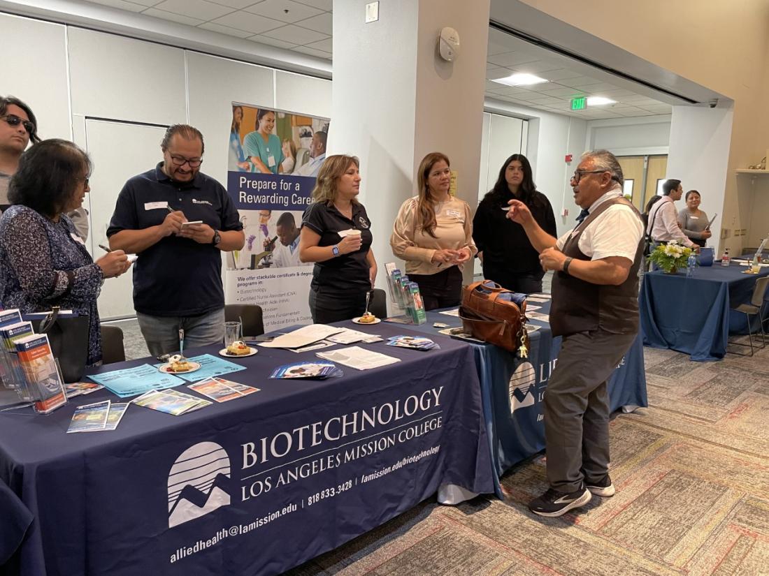 Industry Day attendees discussing opportunities with LAMC faculty and staff