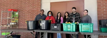 Volunteers at Los Angeles Valley College give out food provided by Student LunchBox.
