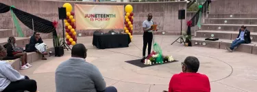 Event coordinator Stephan McGrue is the master of ceremonies at a Juneteenth poetry event at Pasadena City College.