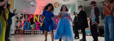 Students at Los Angeles Valley College show off their outfits at the “Undocuqueer Quinceañera”